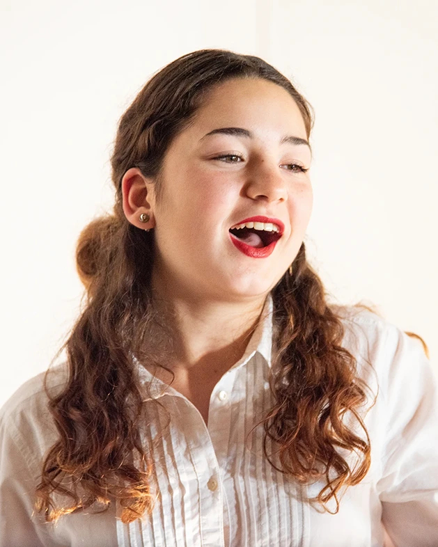 Photo of Girl Singing